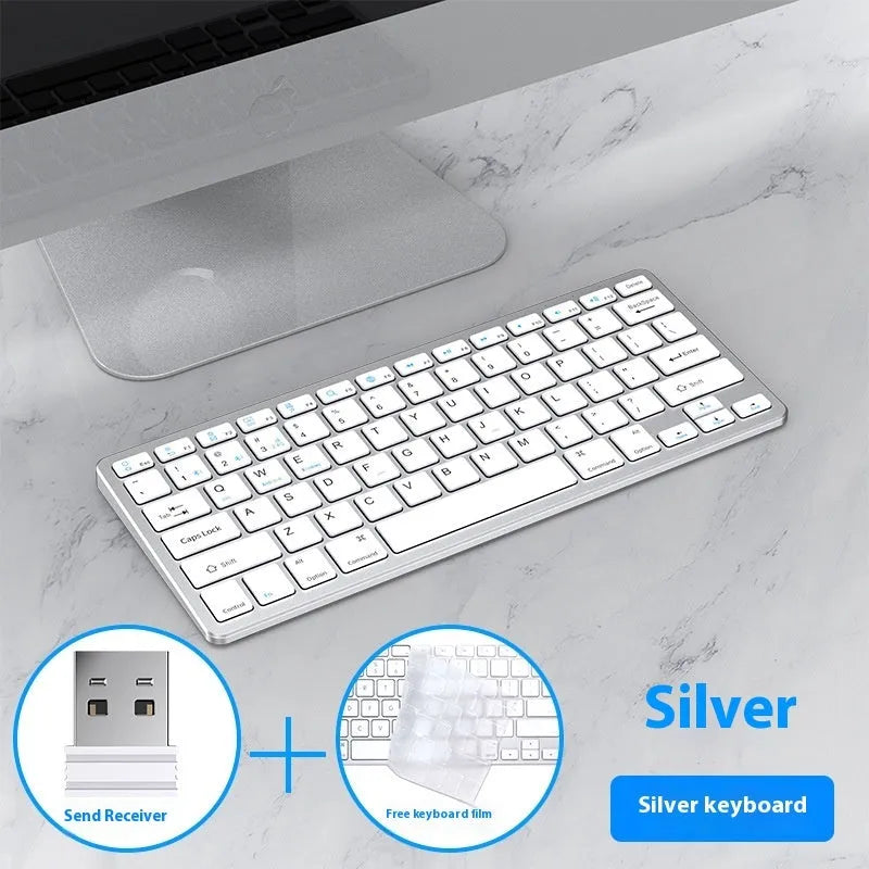 Ultra-thin black wireless keyboard and mouse set with receiver and cover on a desk