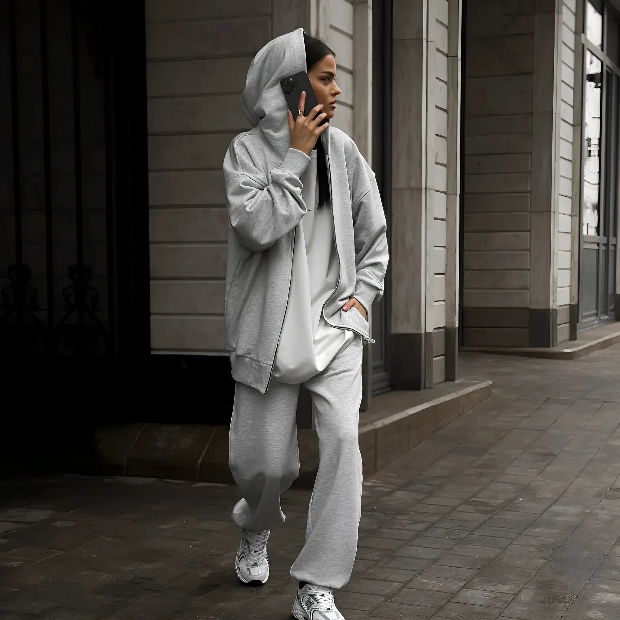 Street style two-piece set featuring long-sleeved coat and matching trousers in loose fit