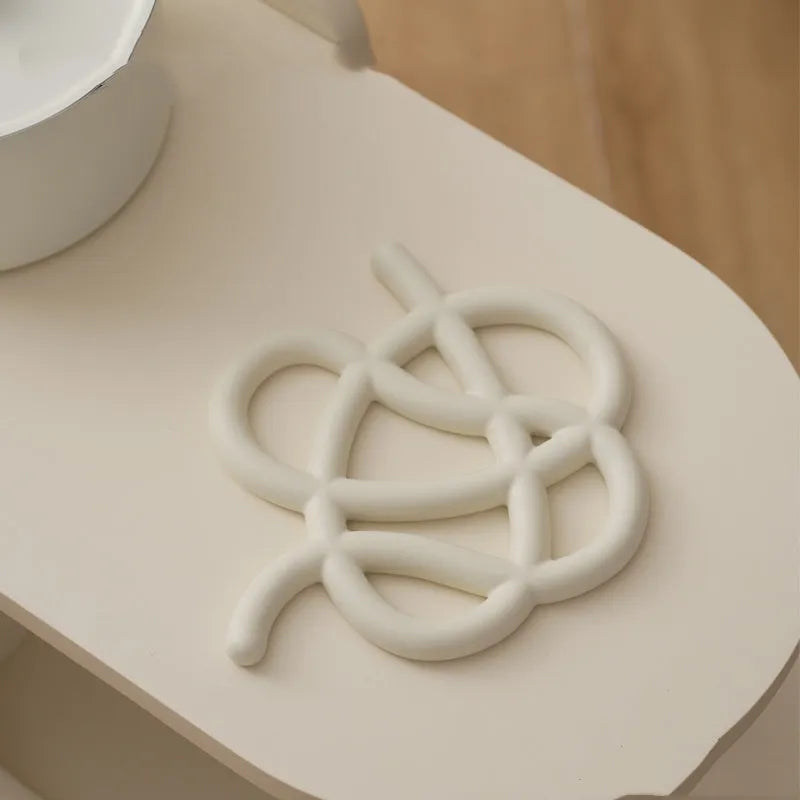 Ceramic heat proof mat with irregular shape design in solid colour options
