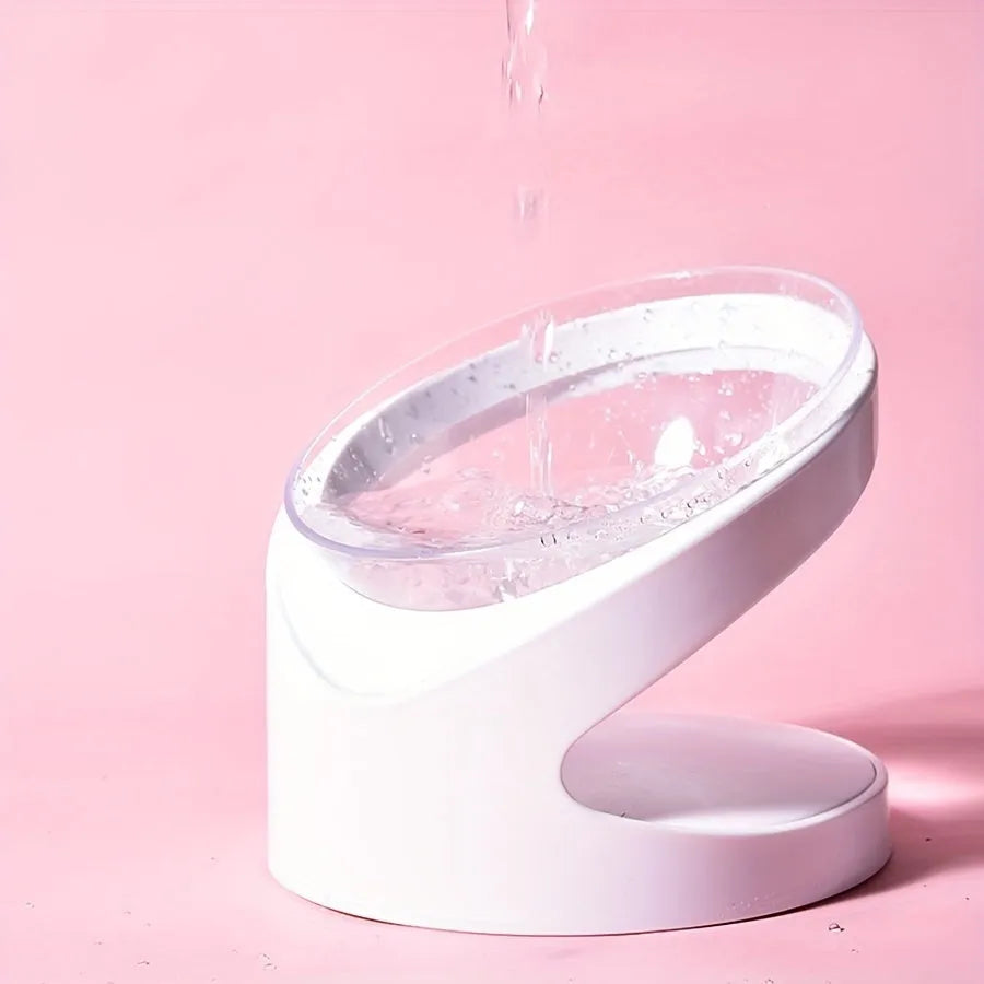 White elevated cat food bowl with clear tilted plastic design for dry and wet food