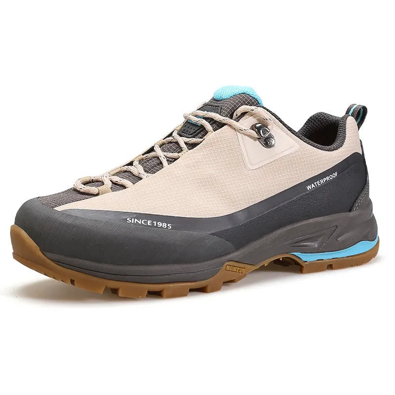 Low-top hiking boots in various colours with non-slip rubber soles and leather mesh upper