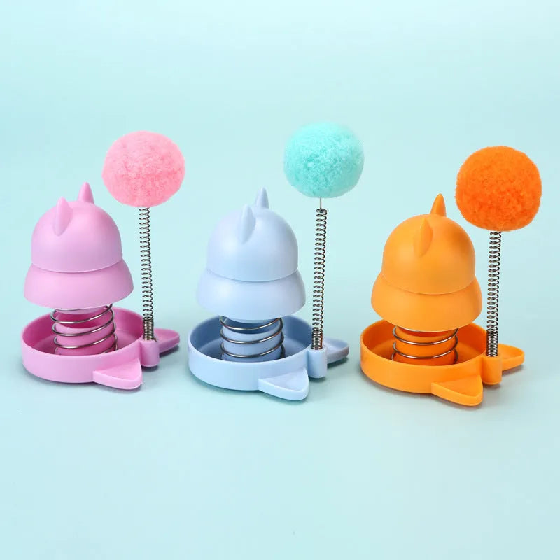 Blue, orange, and pink lucky cat design mint balls for cat dental care and play.