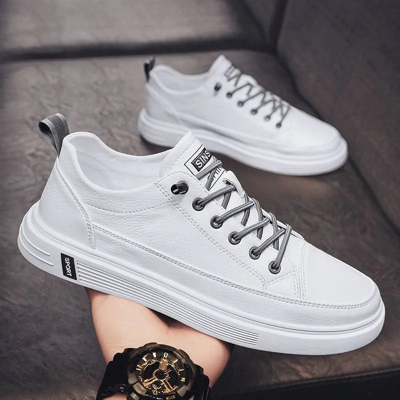 Men's white casual PU shoes with round toe, flat bottom, and low heel on a plain background.