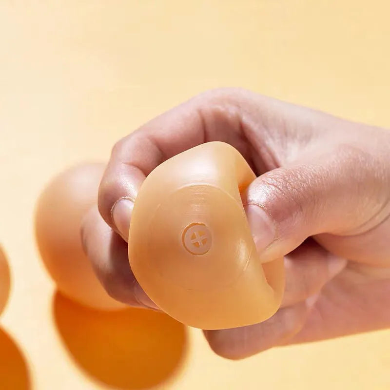 Plastic simulation egg dog toy with sound feature for teeth cleaning and interactive play