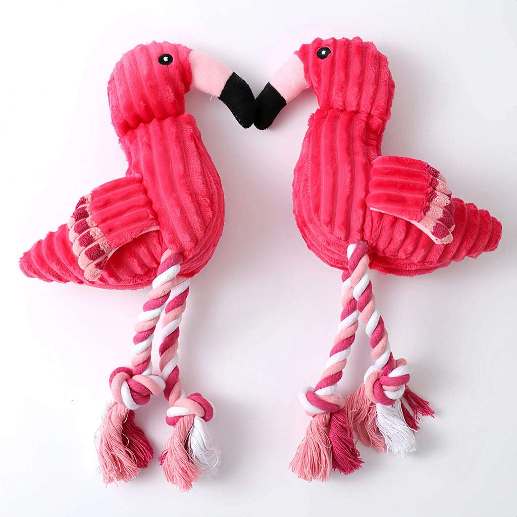 Pink animal-shaped corduroy plush dog toy with a squeaker inside
