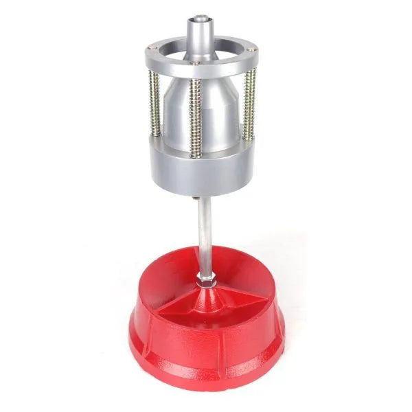 Portable aluminium head hub balancer for car and truck tyres with bull's eye level on a black enamel base.