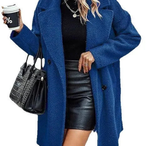 Women's mid-length coat with fur collar, button front, and side pockets in black