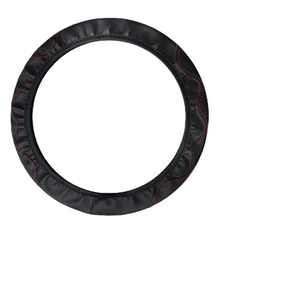 Elastic embossed steering wheel cover for 37-38cm diameter wheels in various colours.