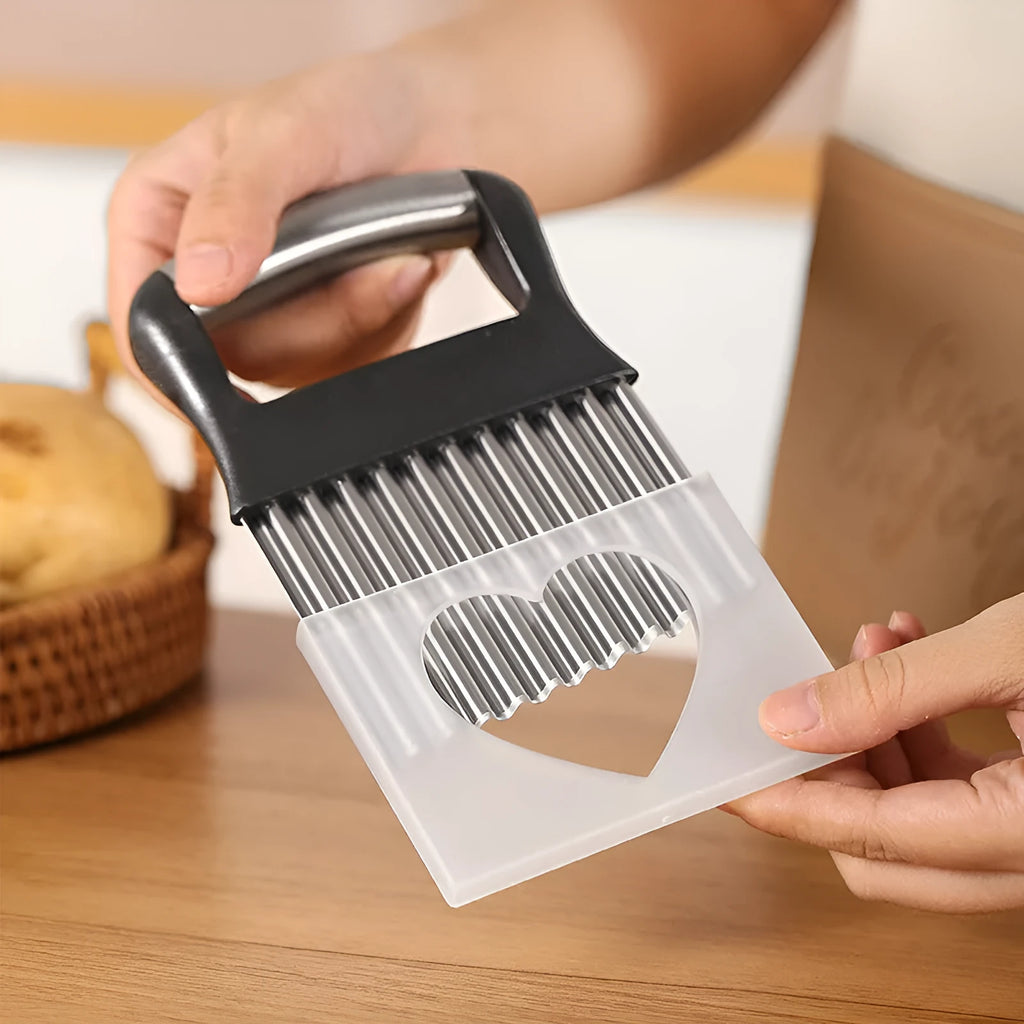 Stainless steel potato wave knife for cutting crinkle chips, shown in black on a kitchen surface.
