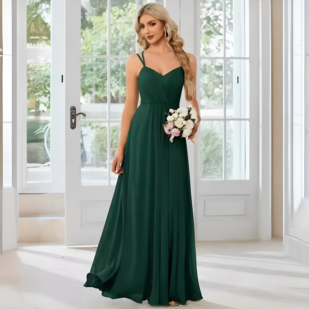 Women's sleeveless pleated A-line dress in light green with sling neckline for banquet occasions