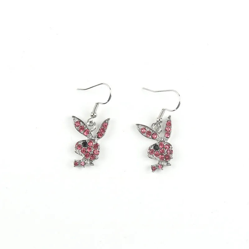 Cute rabbit-shaped stud earrings in silver, pink, or gold colour on a white background.