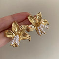 Golden H1795 pearl flower earrings with metal floral design and Seiko gold plating