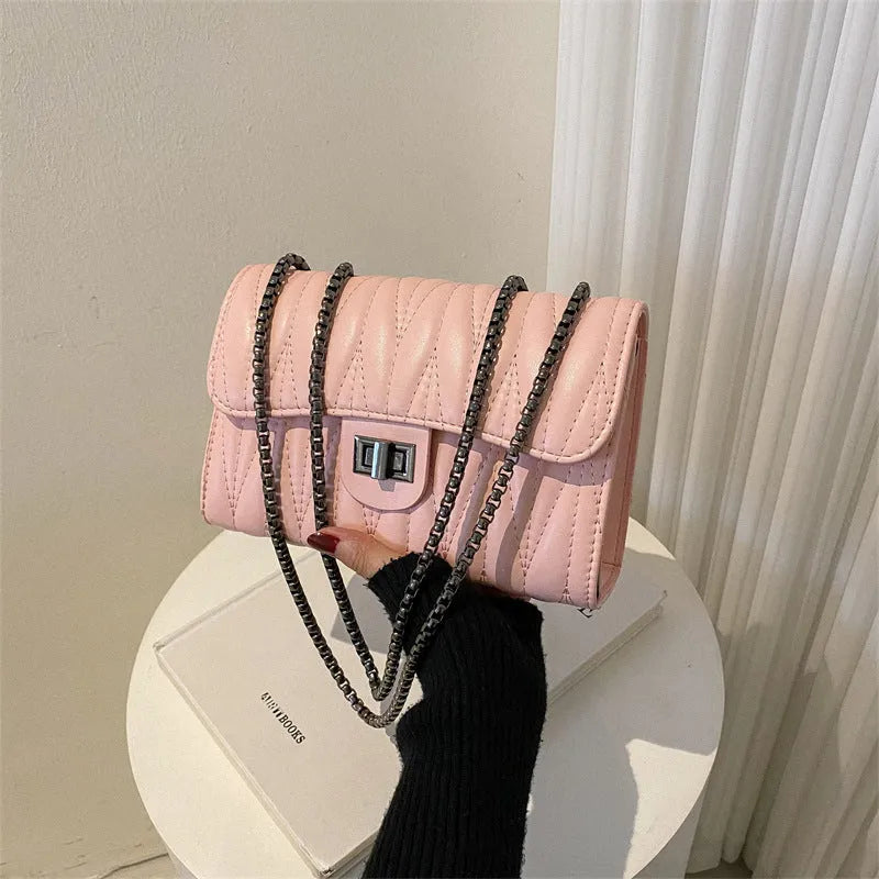 Retro textured diamond pattern small PU leather bag in a horizontal square shape, shown in beige colour.