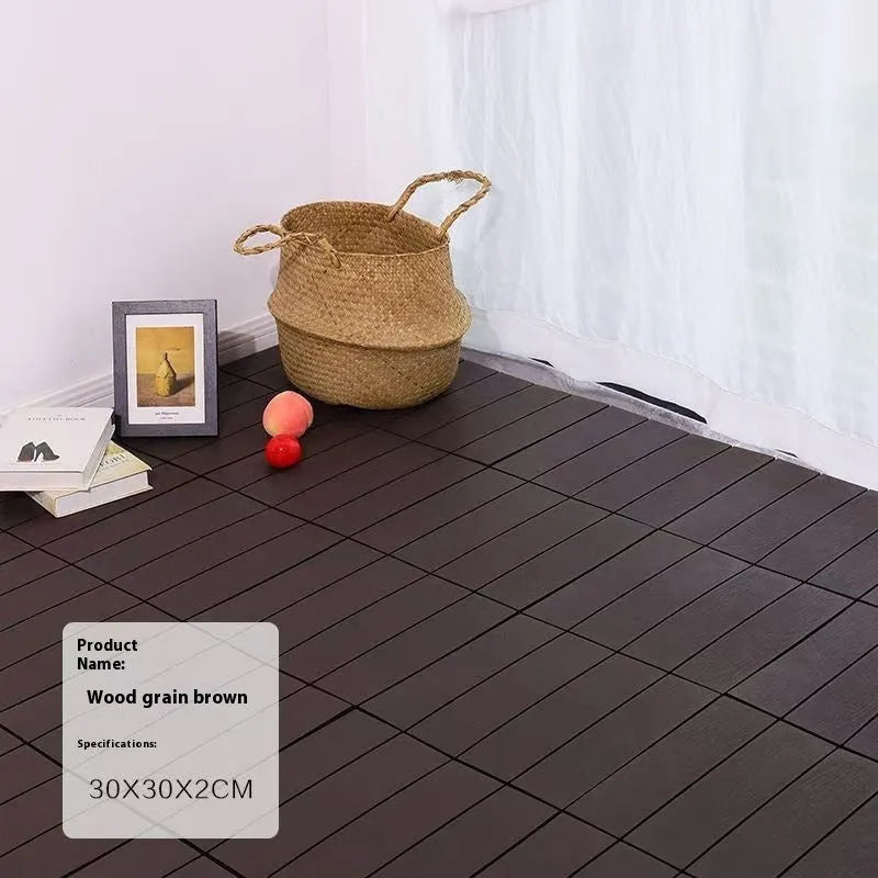 Wood grain plastic interlocking floor tile showing non-slip surface texture