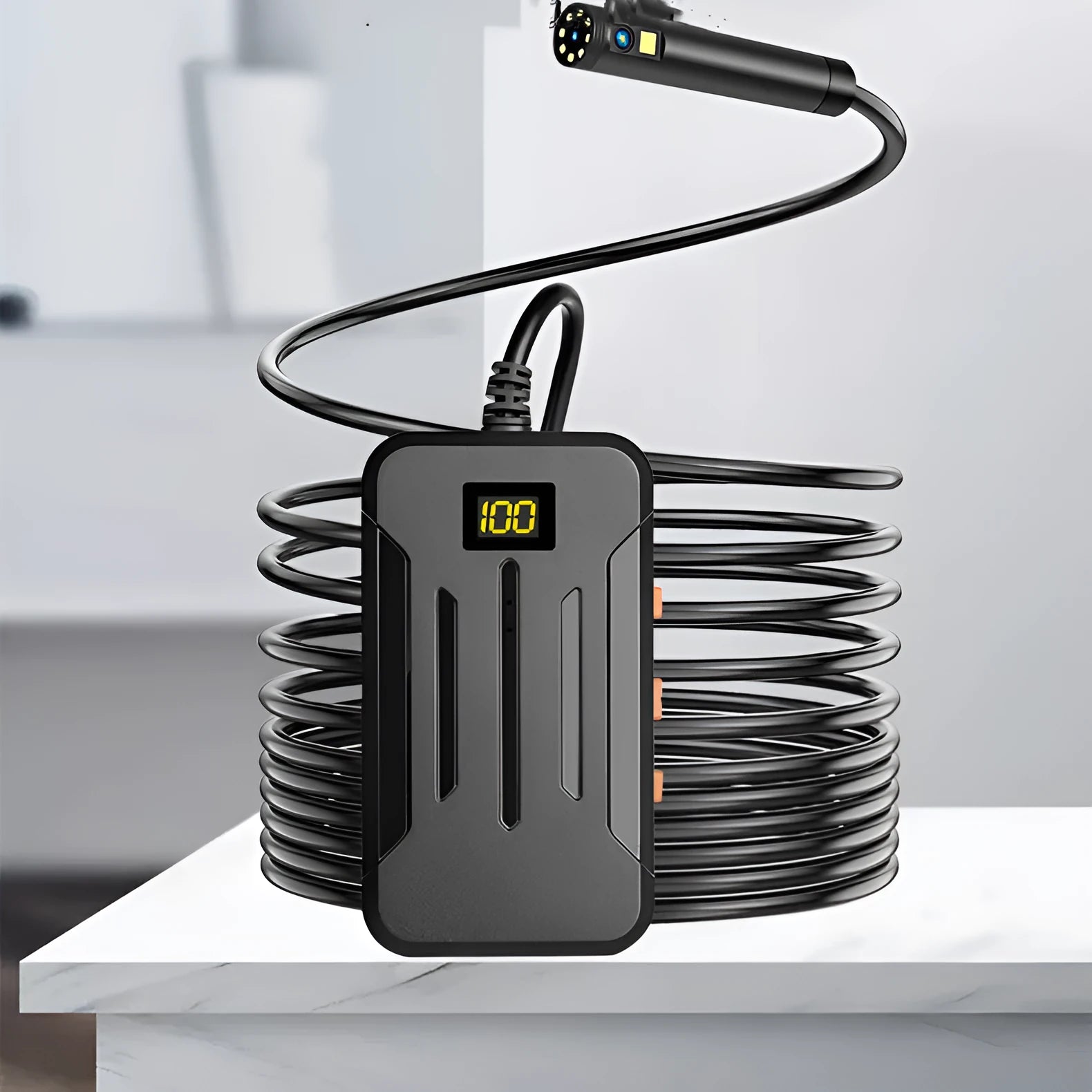 F300 wireless dual lens endoscope with IP68 waterproof probe, magnet, and hook accessories on a table