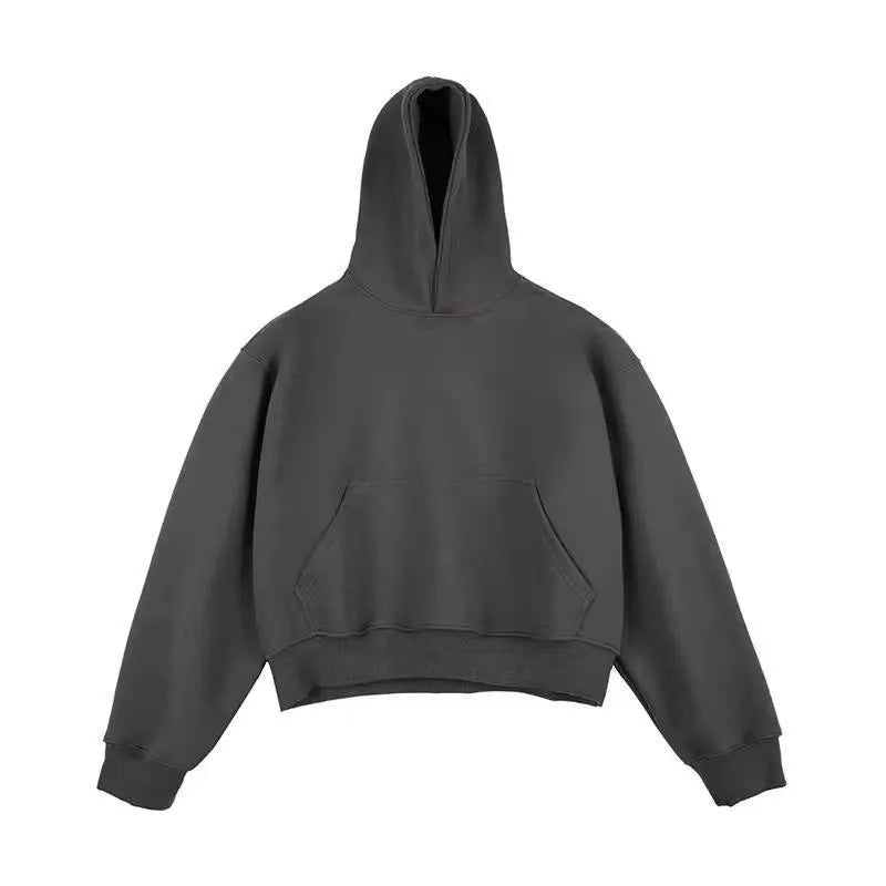 Men's short black Chinese cotton velvet hooded sweater with the hood down on a hanger.