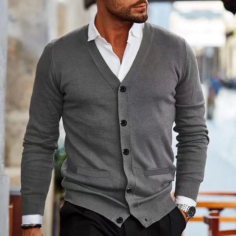 Men's slim fit acrylic cardigan sweater in autumn colours on a hanger
