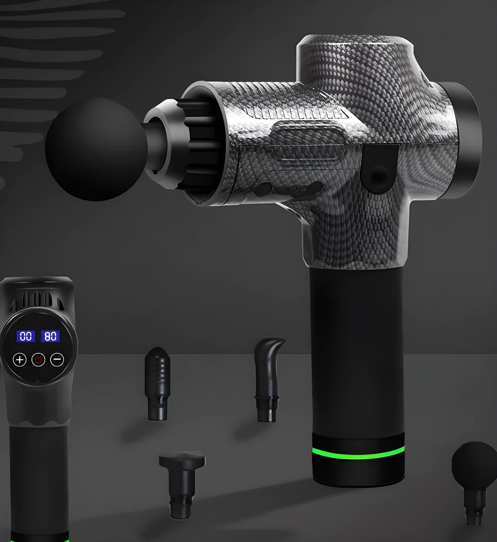 Black electric muscle massage gun with seven different coloured silicone heads on a table.
