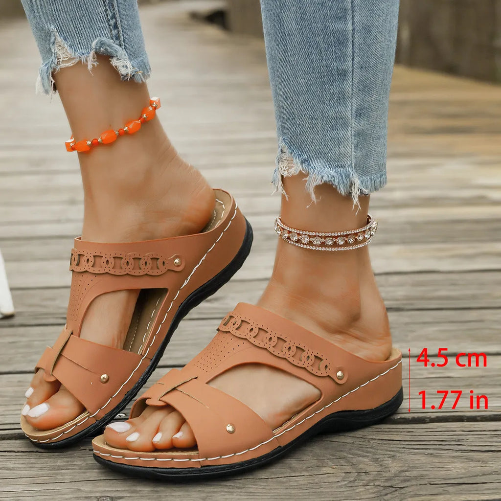 Casual Roman style slope heel slippers with a fish mouth toe holder, shown in available colours.