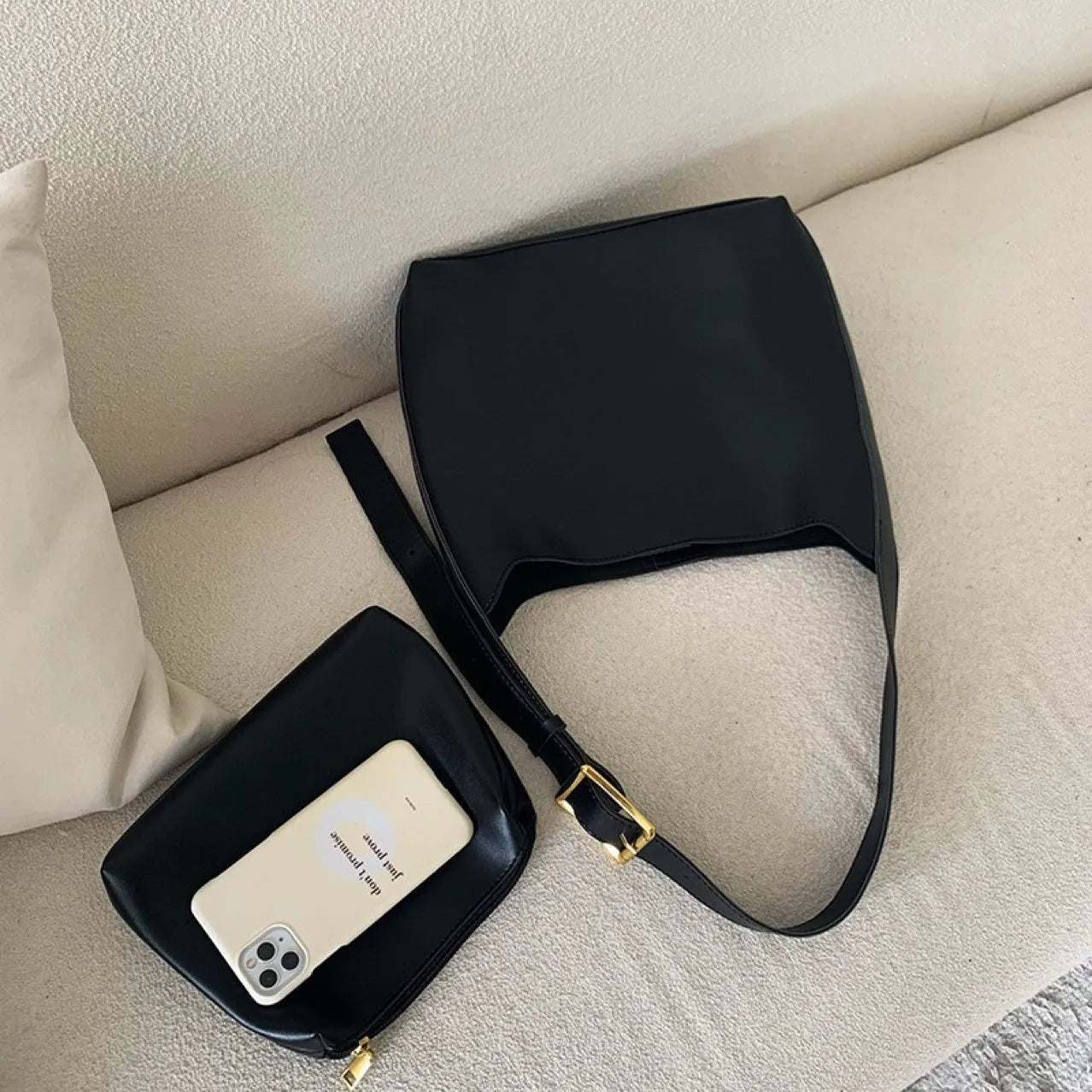 Women's black and brown shoulder bags with swinging threads and soft PU leather construction