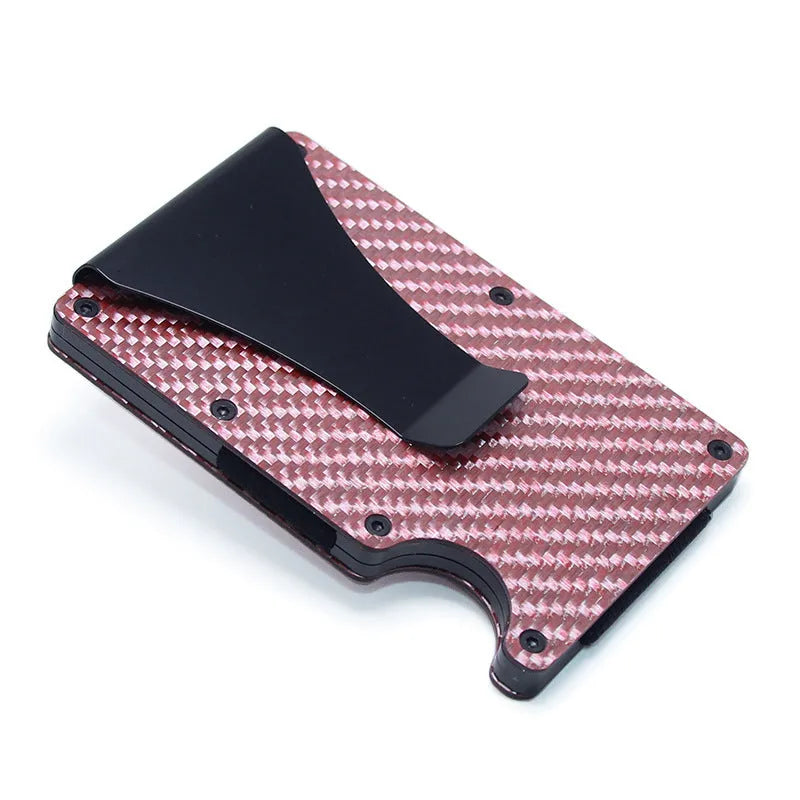 Geometric aluminium and carbon fibre card wallet for business cards and banknotes in a gift box.