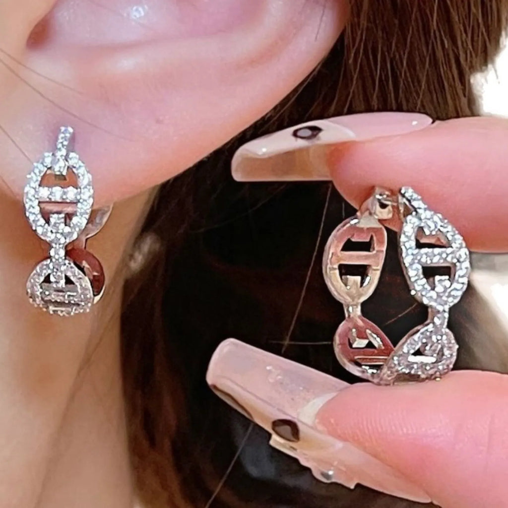 Ladies casual earrings with diamond-effect design in silver, gold, or rose gold metallic finishes