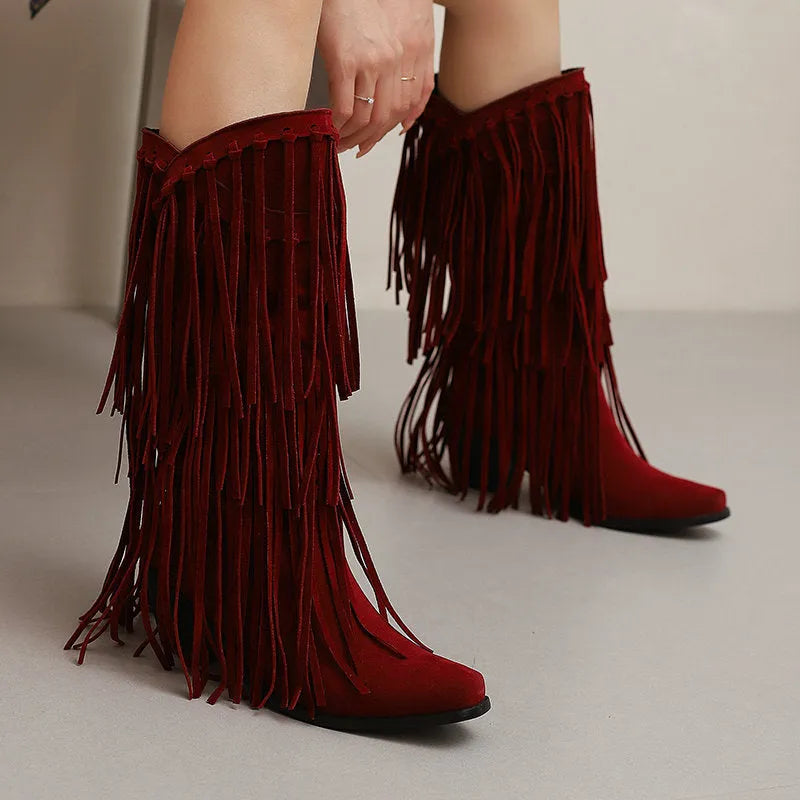 Women's suede knee-high boots with tassels, a square toe, and a chunky waterproof platform sole.