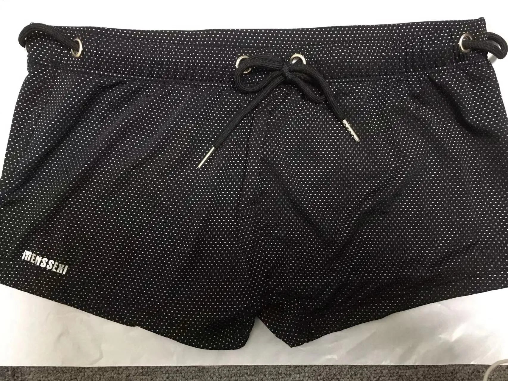 Men's low waist boxer style nylon swimming trunks in multiple solid colours