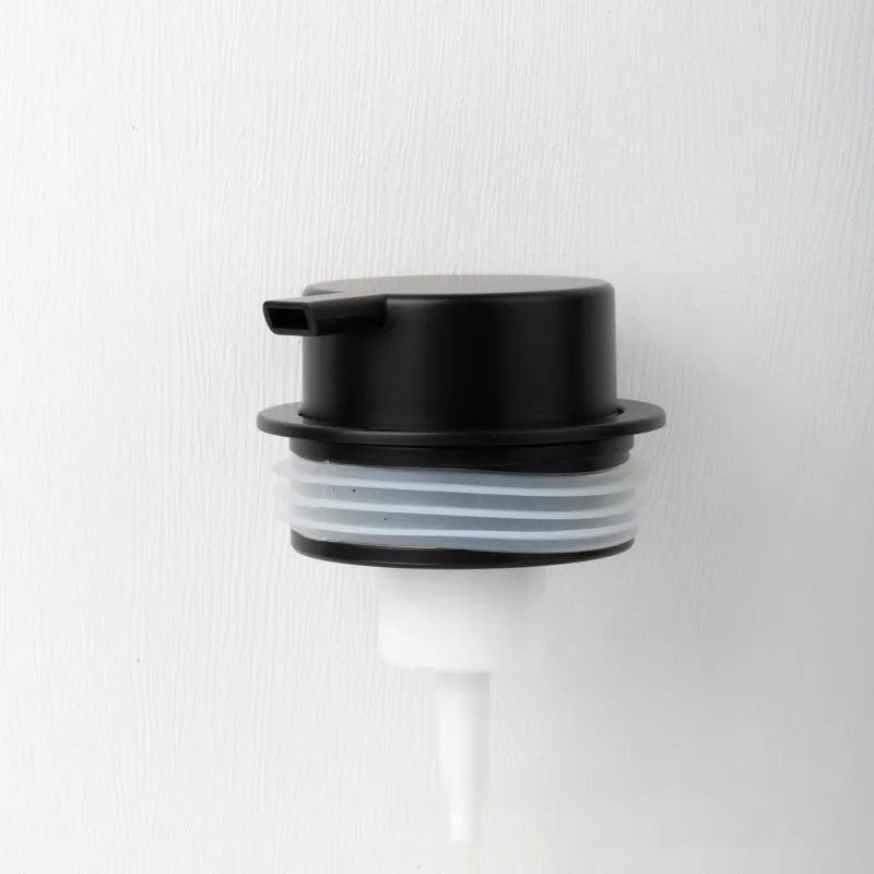 Large plastic foam pump dispenser for facial cleansers in a metallic gold finish