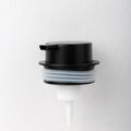 Large plastic foam pump dispenser for facial cleansers in a metallic gold finish