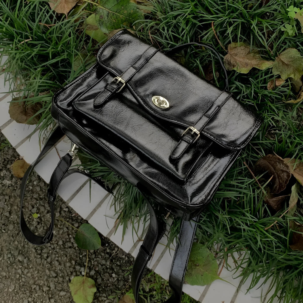 Black college messenger bag for women with oil wax leather look, 35cm length