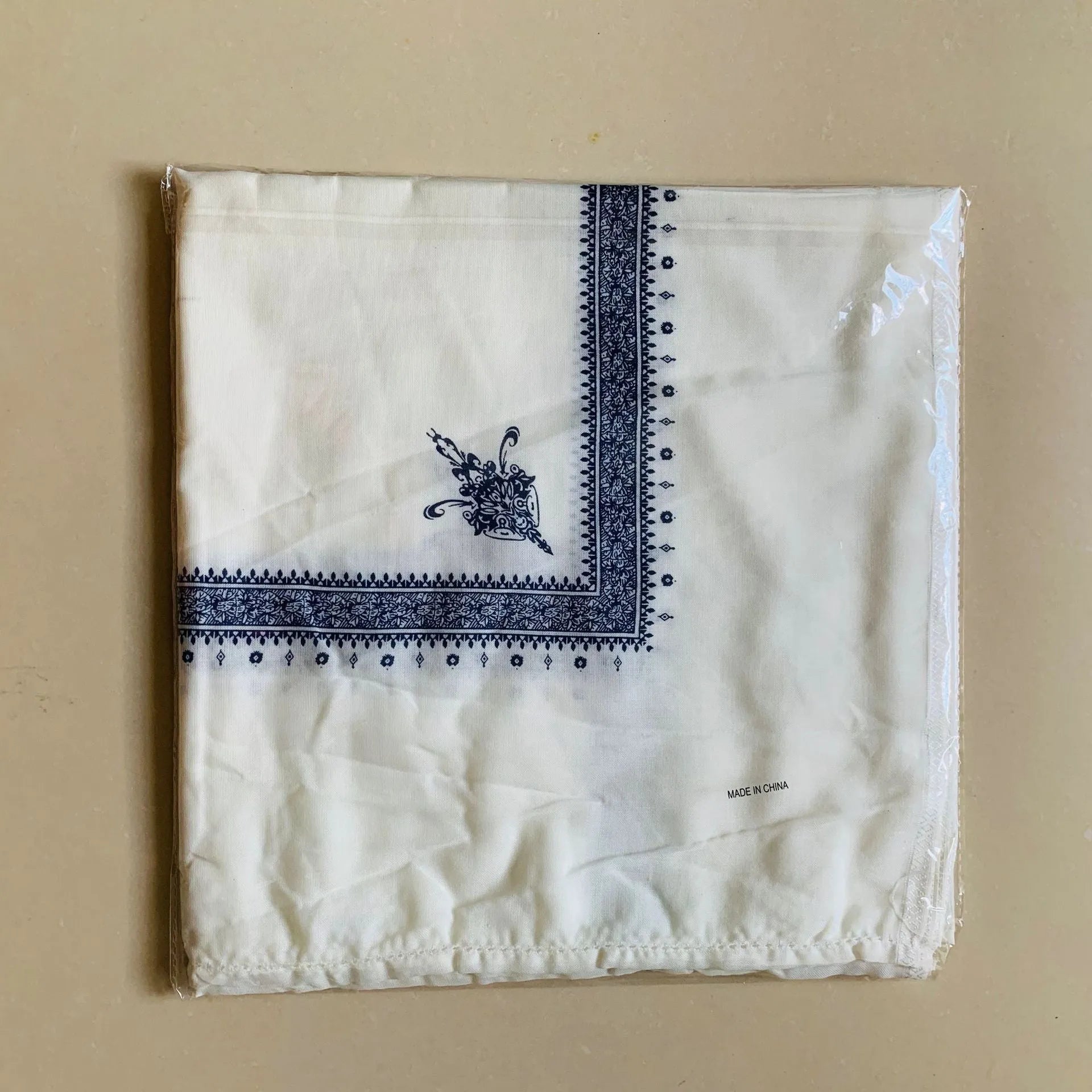 Printed square polyester scarf showing 138cm dimensions and printed pattern design in available colours
