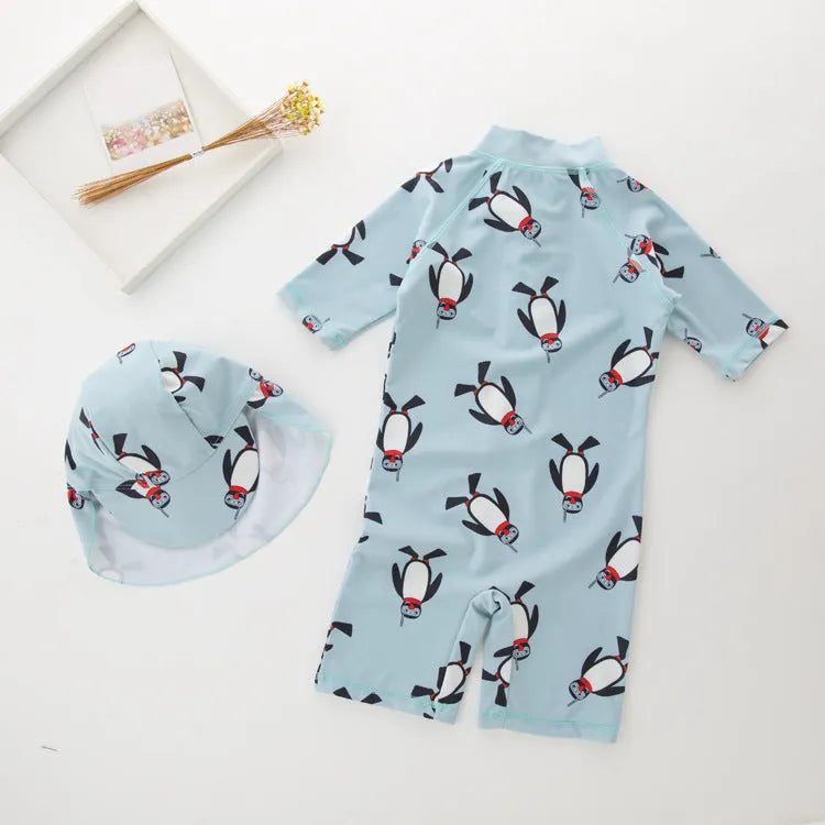 Boys penguin design swimwear set with long sleeves and matching swimming cap