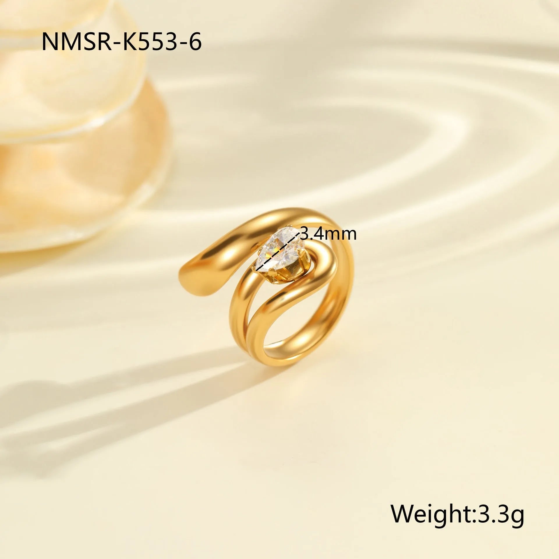 Geometric open mouth stainless steel zircon ring in a free size on a hand.