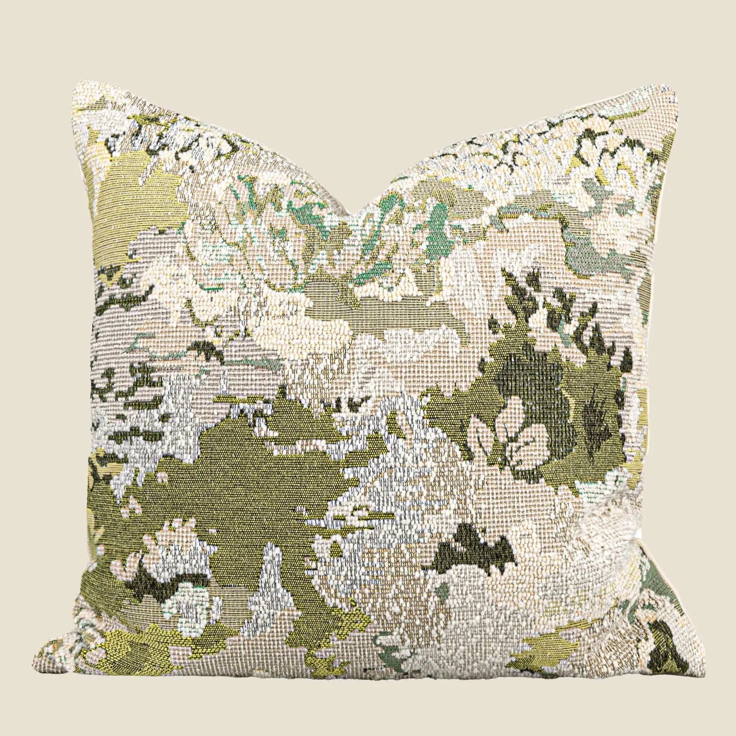 Antique green wool blend cushion with abstract spring flowers pattern, shown in square and lumbar sizes.