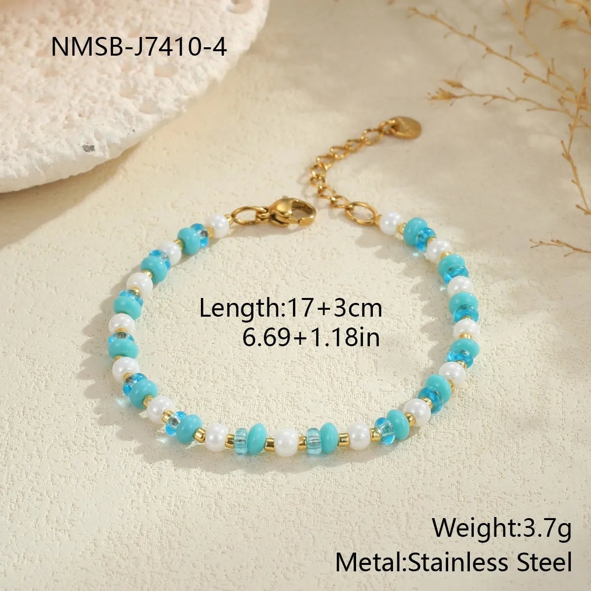 18K gold plated stainless steel chain necklace with pink electroplated resin bead pendant on white background