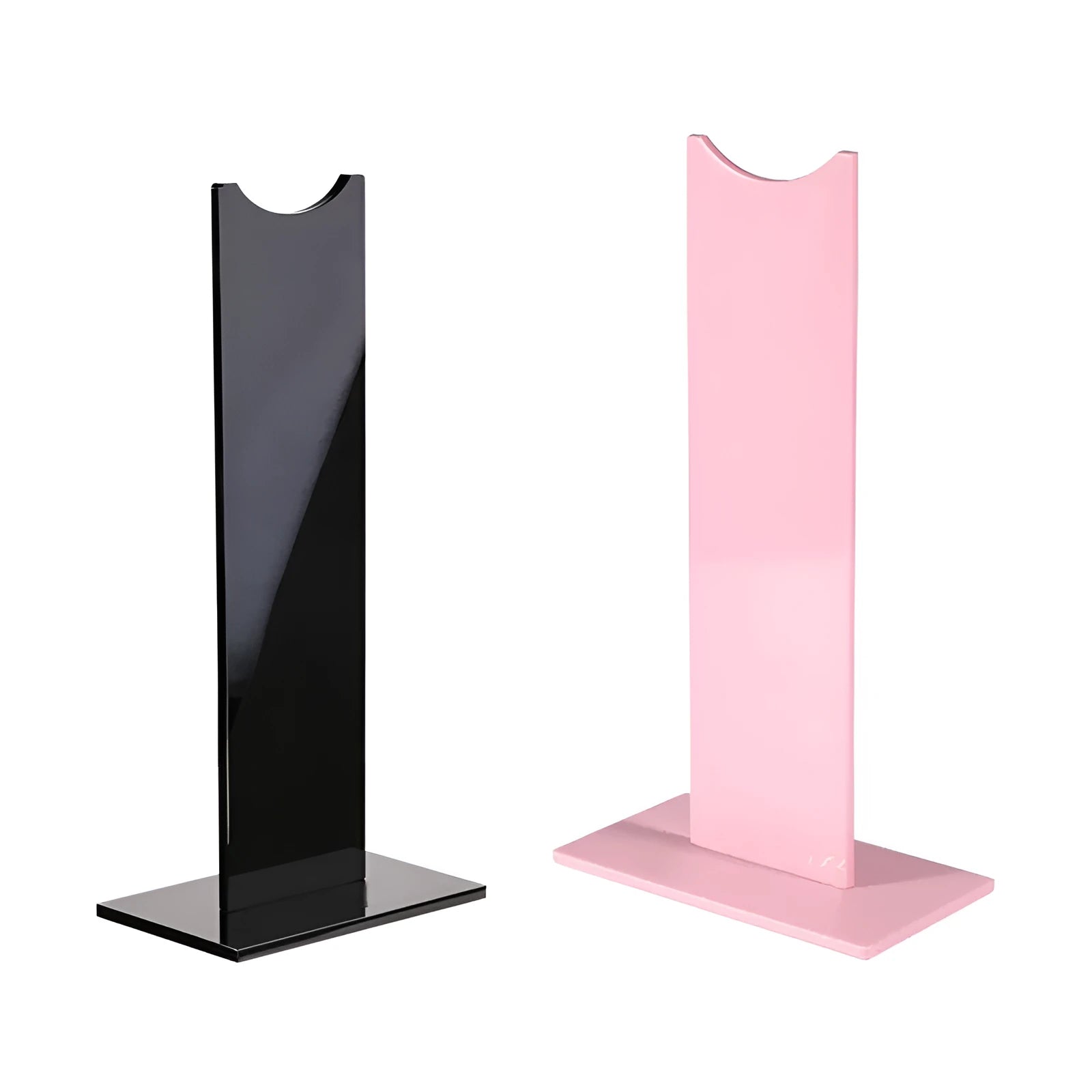 Pink and black detachable head-mounted headphone stand on a desk with a non-slip silicone base.