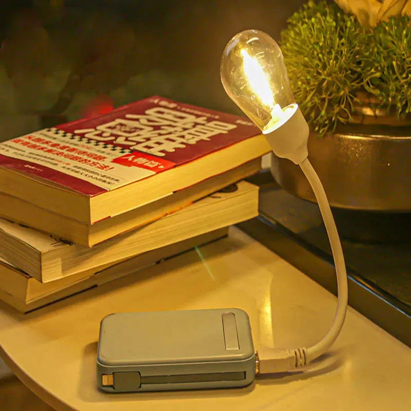 USB rechargeable folding night light with tungsten LED bulb in folded and unfolded positions