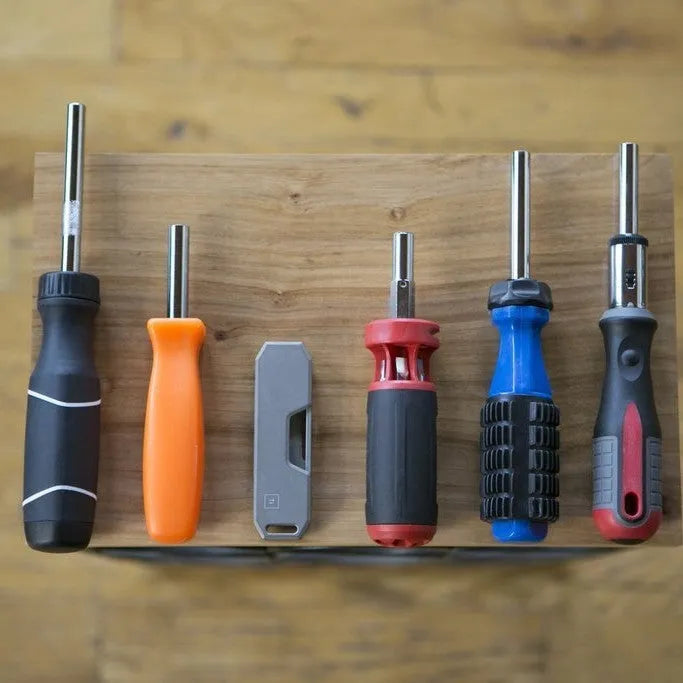 Creative outdoor EDC pocket tool set with metal alloy body and multiple heads in black and gray options