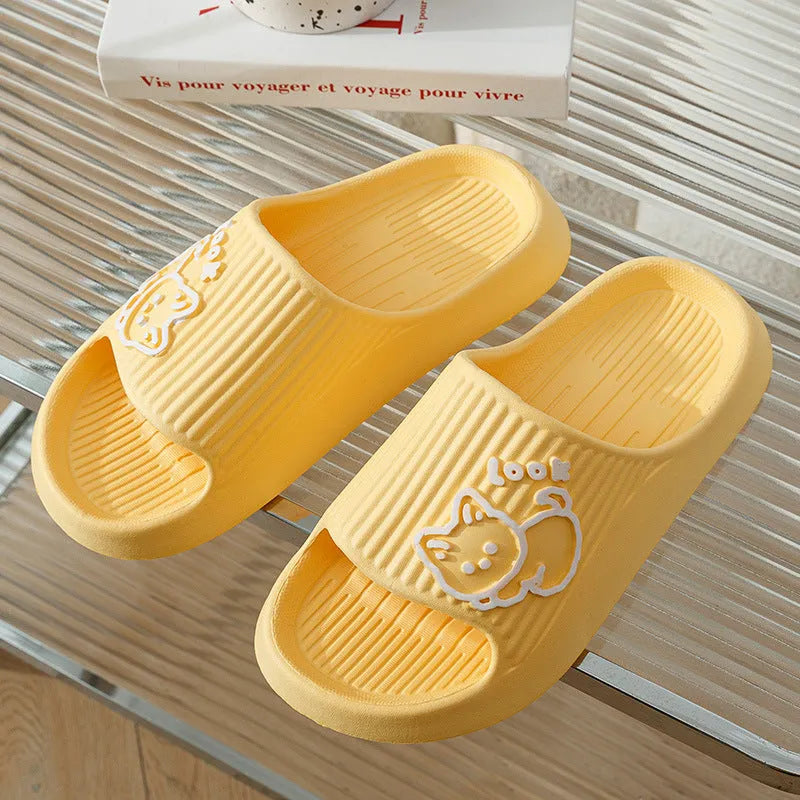 Women's green cat slippers with thick EVA platform sole, shown from above.