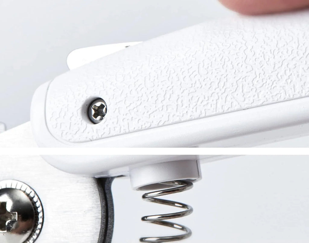 White pet nail clippers with LED light, transparent guard, and nail file for cats and dogs