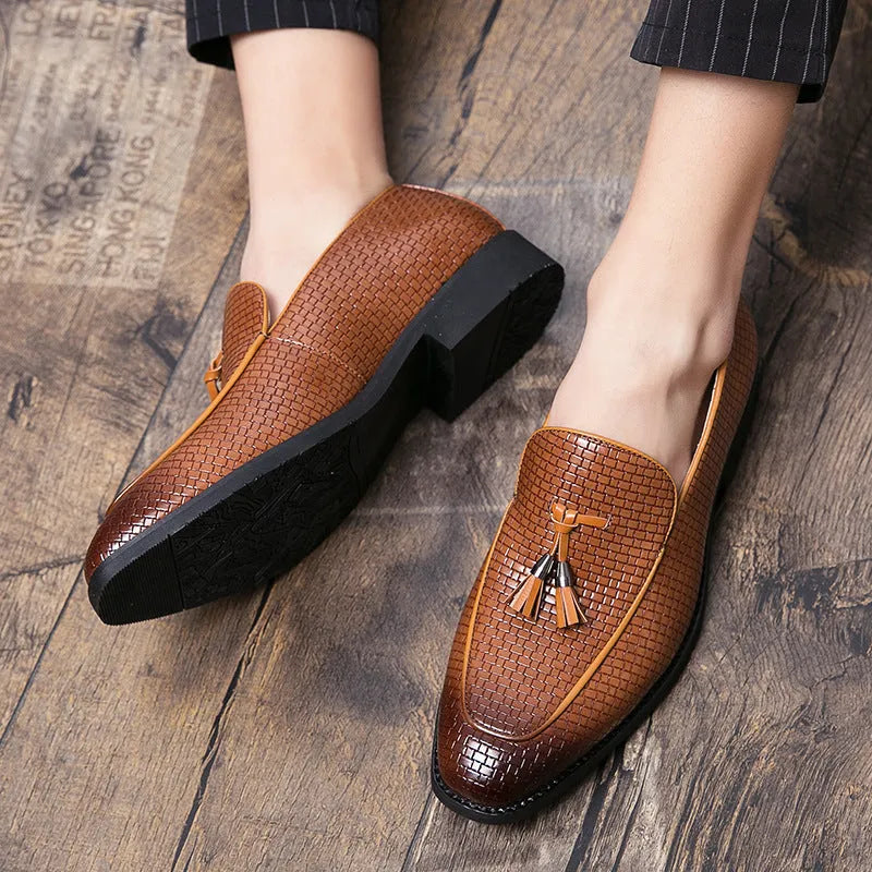 Men's black pointed toe slip-on business shoes with decorative tassel on artificial PU upper