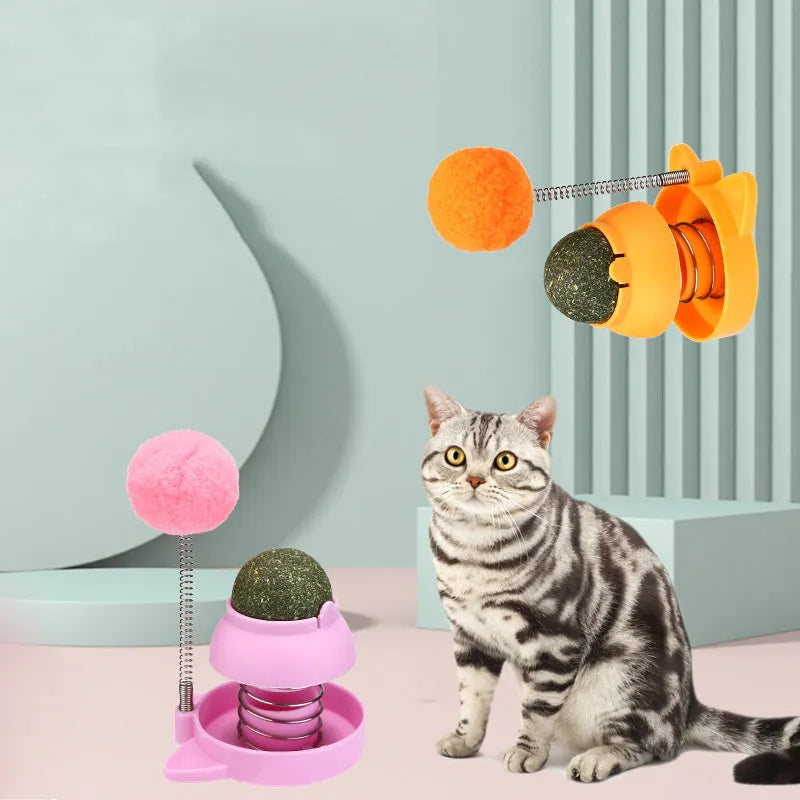 Blue, orange, and pink lucky cat design mint balls for cat dental care and play.