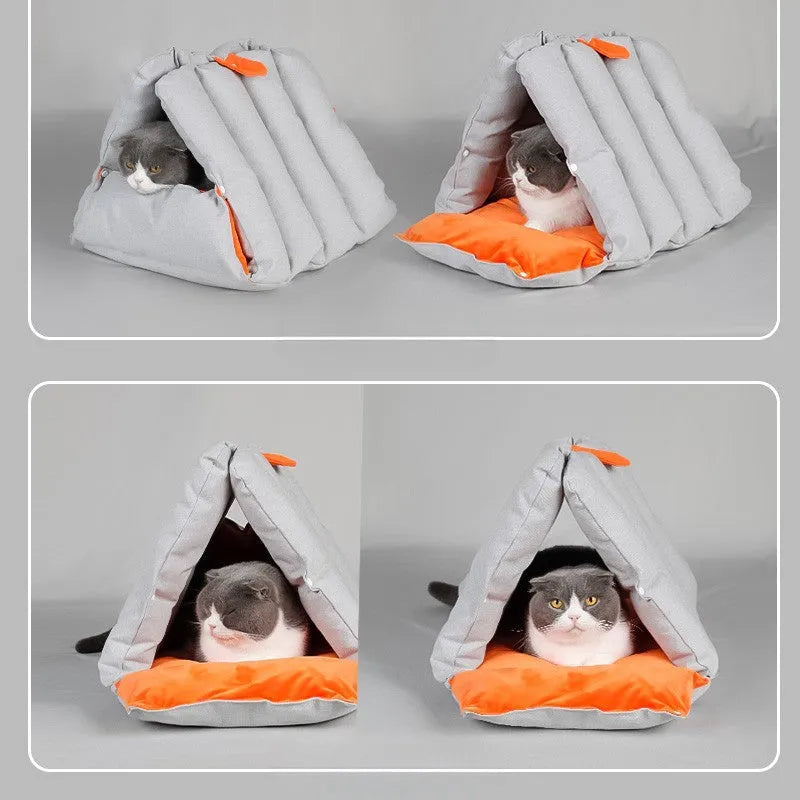Triangular cat bed with blue removable cotton cover showing combination holes