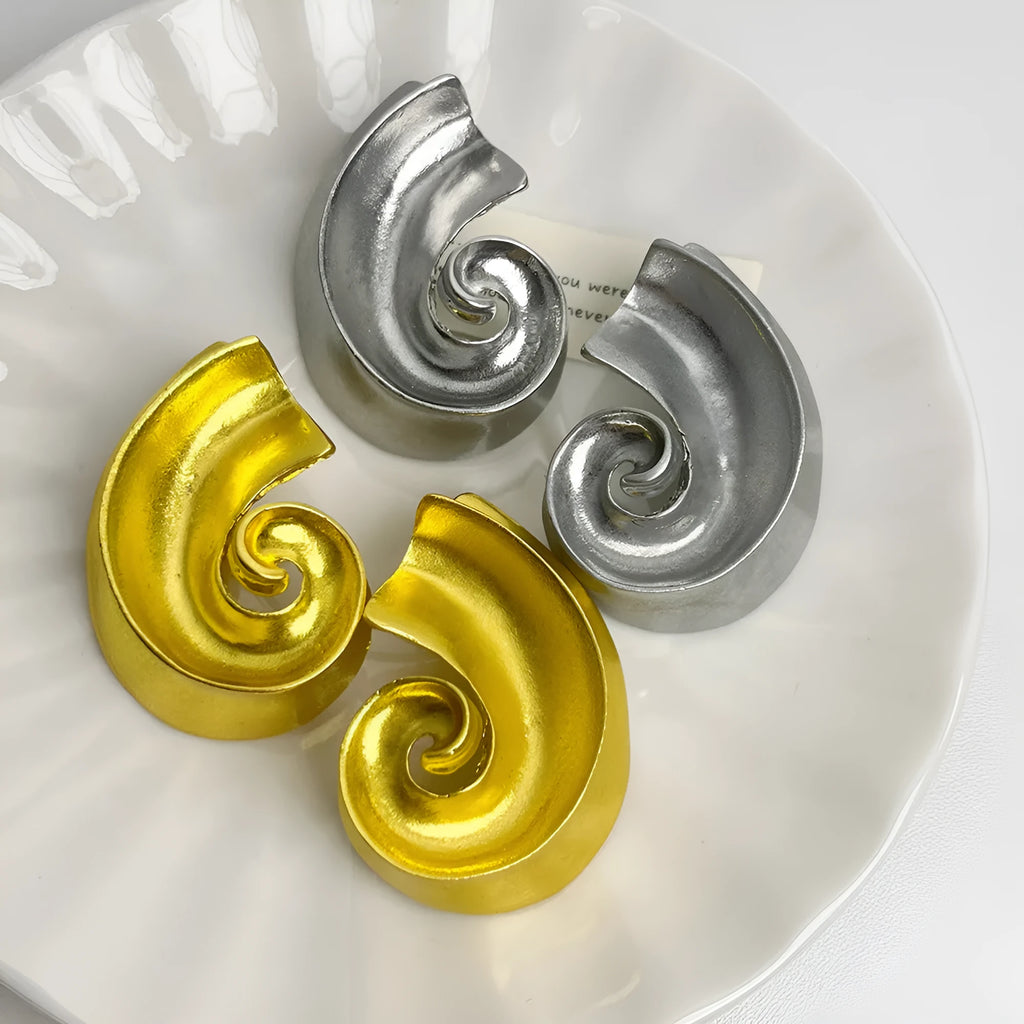 Geometric retro design ear studs in gold and silver colours measuring 5cm
