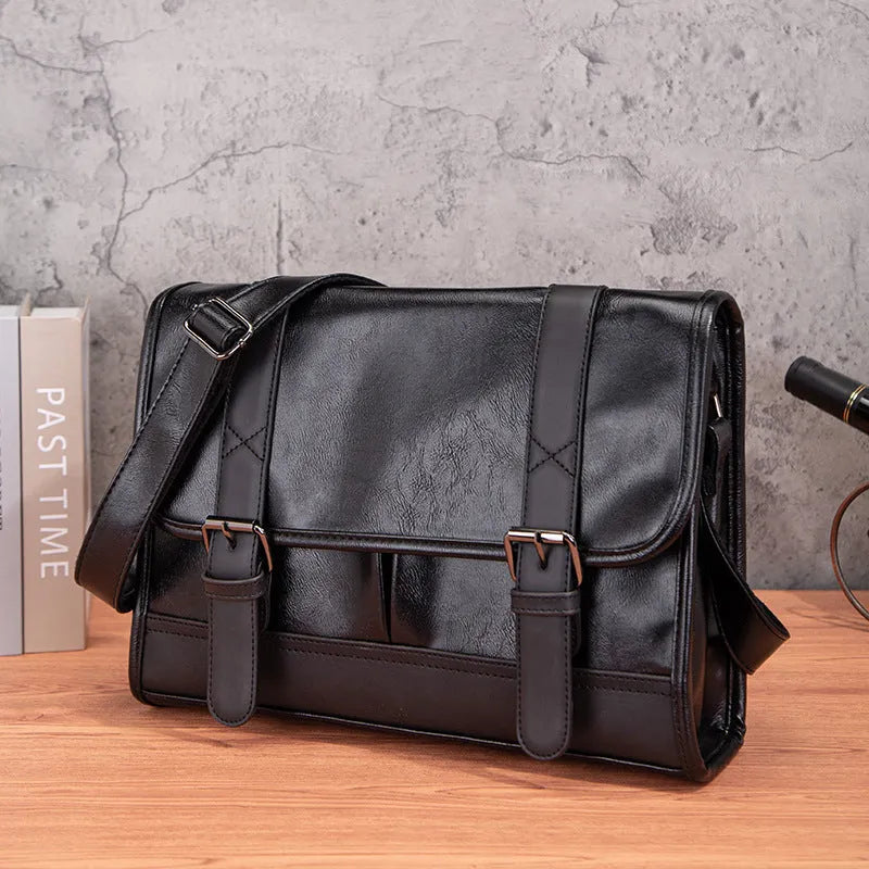 Black Korean-style men's anti-theft backpack with PU leather exterior and contrast stitching
