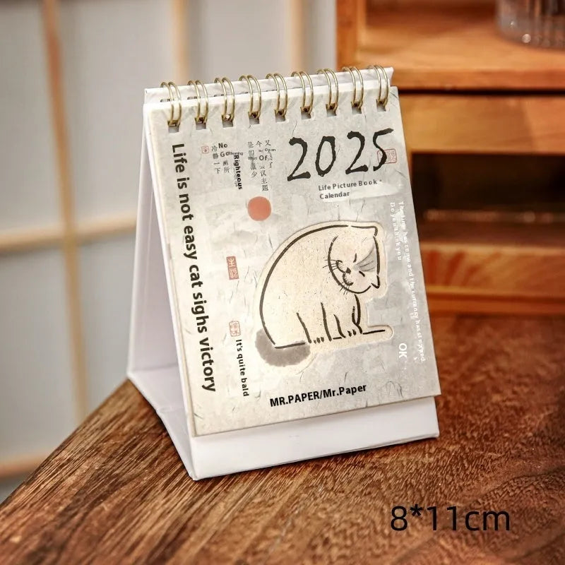 Coffee themed mini desk calendar 2025 with ten different daily designs including Coffee Time and Life Is Not Easy