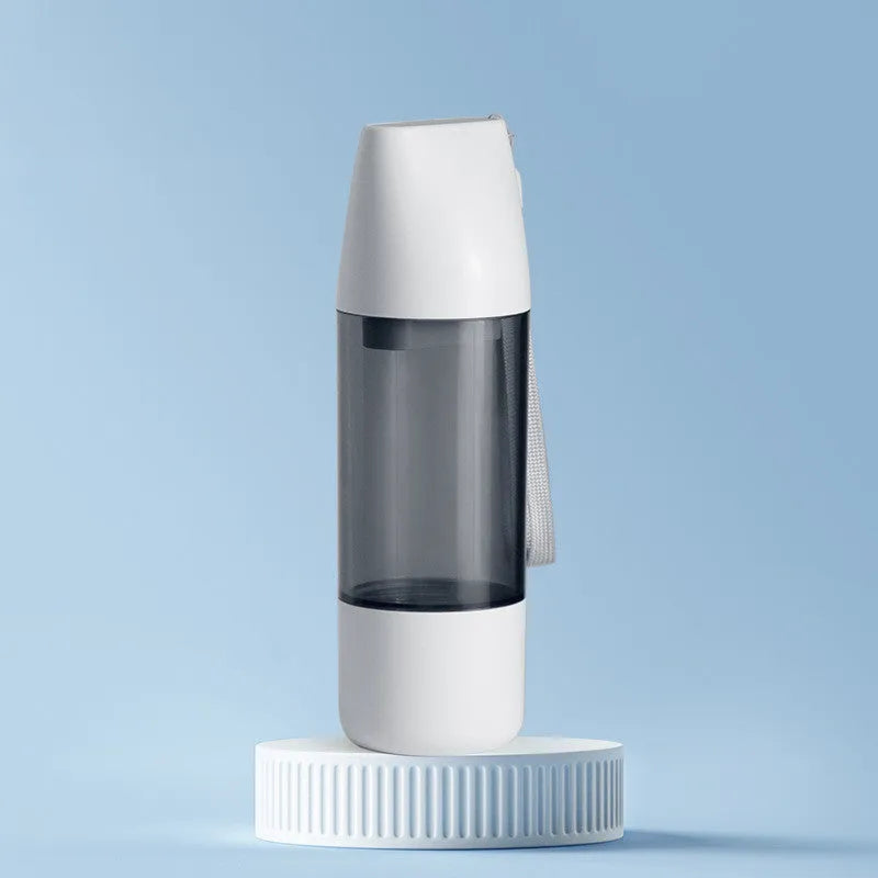 Portable dog water bottle with white food-grade ABS body and separate water and grain compartments