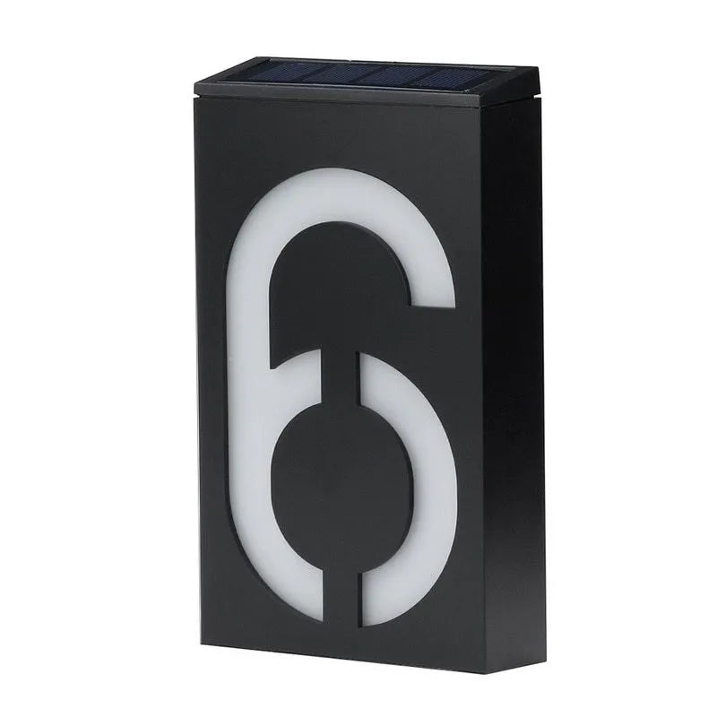 Solar powered house number light with white LEDs illuminating digit, IP65 waterproof outdoor design