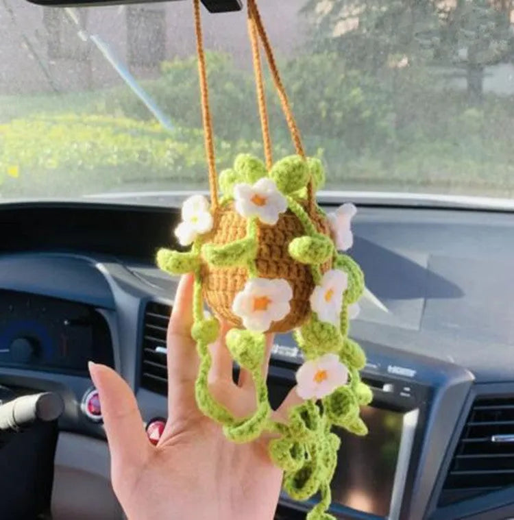 Green and white knitted rope car plant ornament with 8cm base and hanging rope.